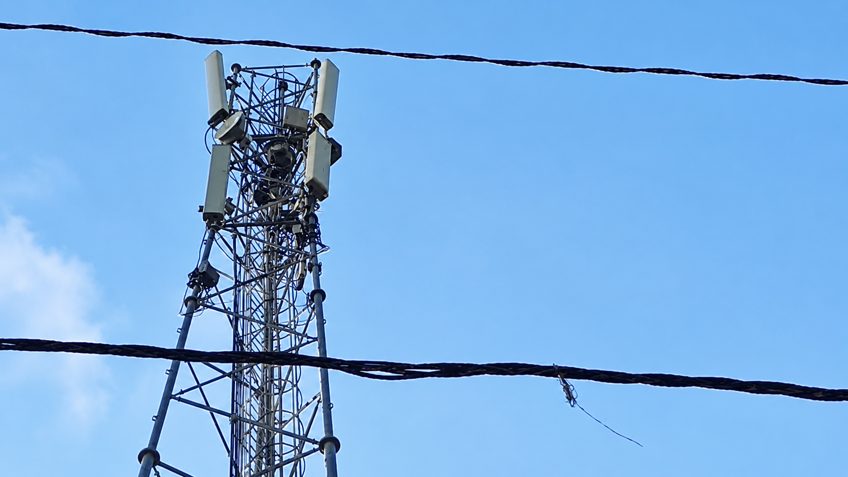 Teenage girl climbs mobile tower